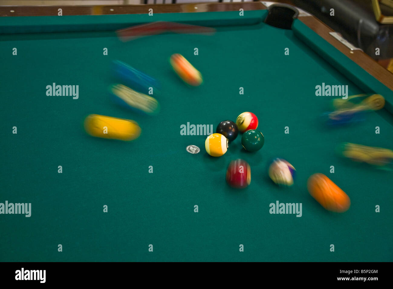 pool hall billiards cue green explode ball shoot concentrate Stock