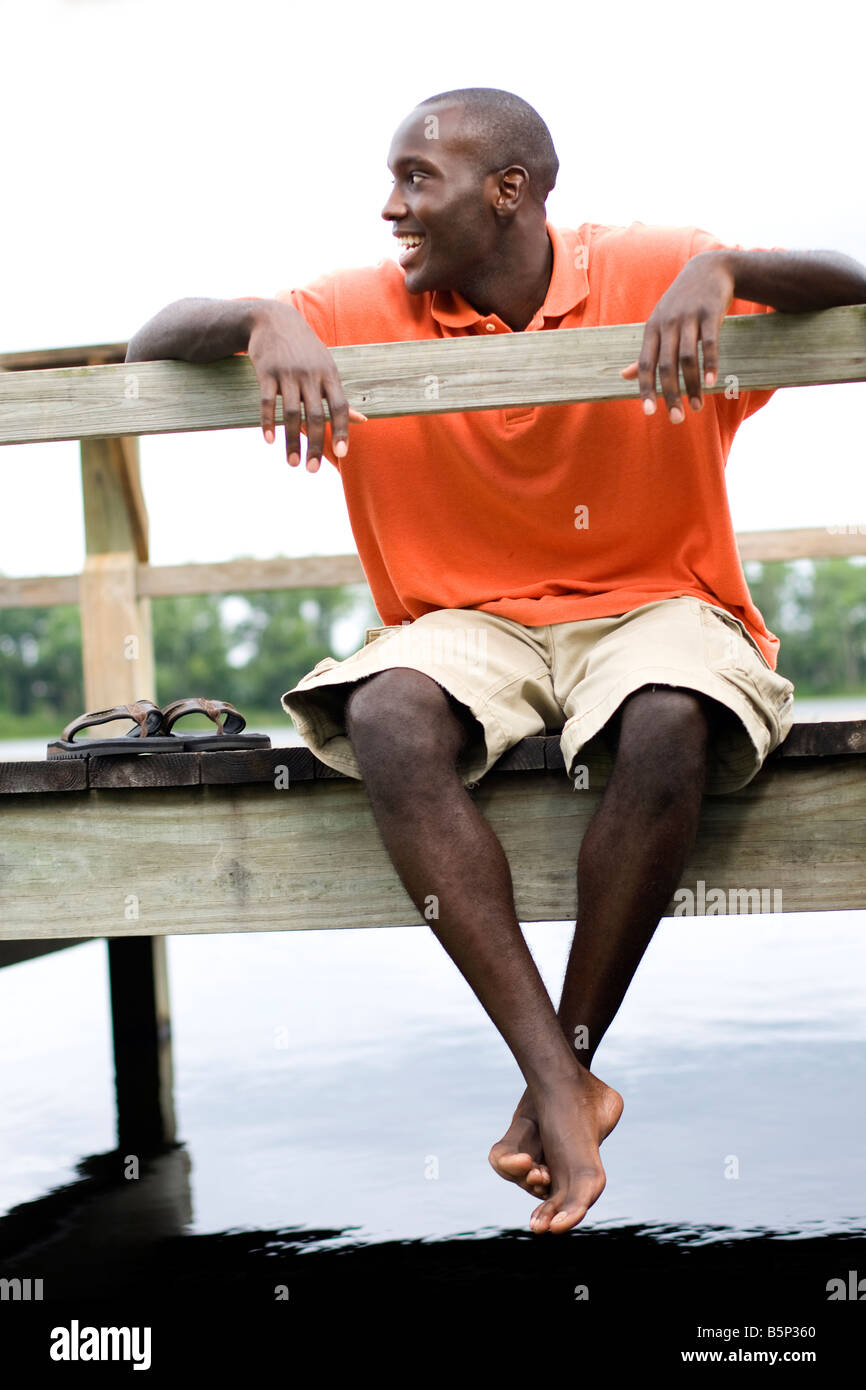 Person wearing orange shirt hi-res stock photography and images - Alamy