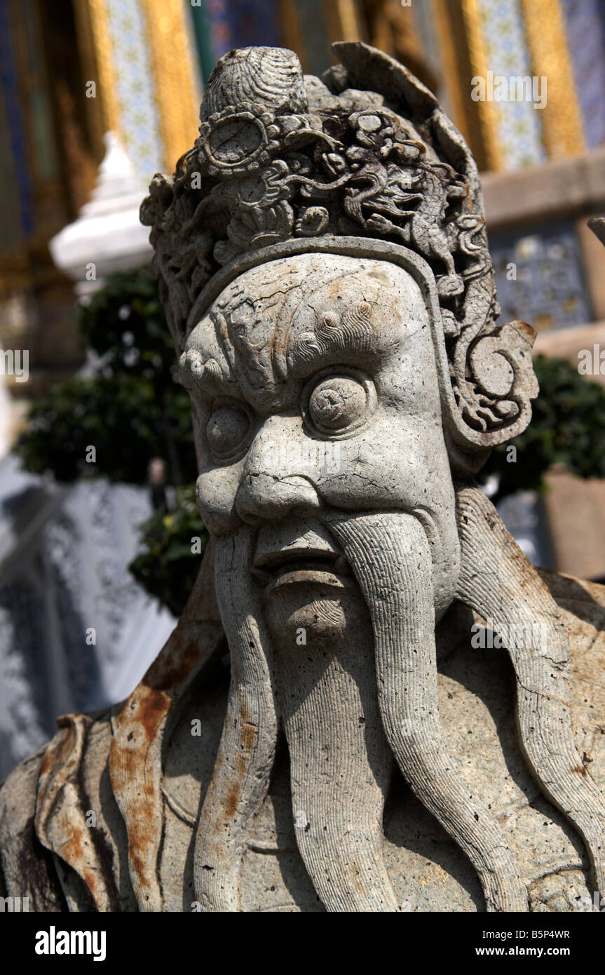 A statue at the Grand Palace complex in Bangkok, Thailand Stock Photo ...