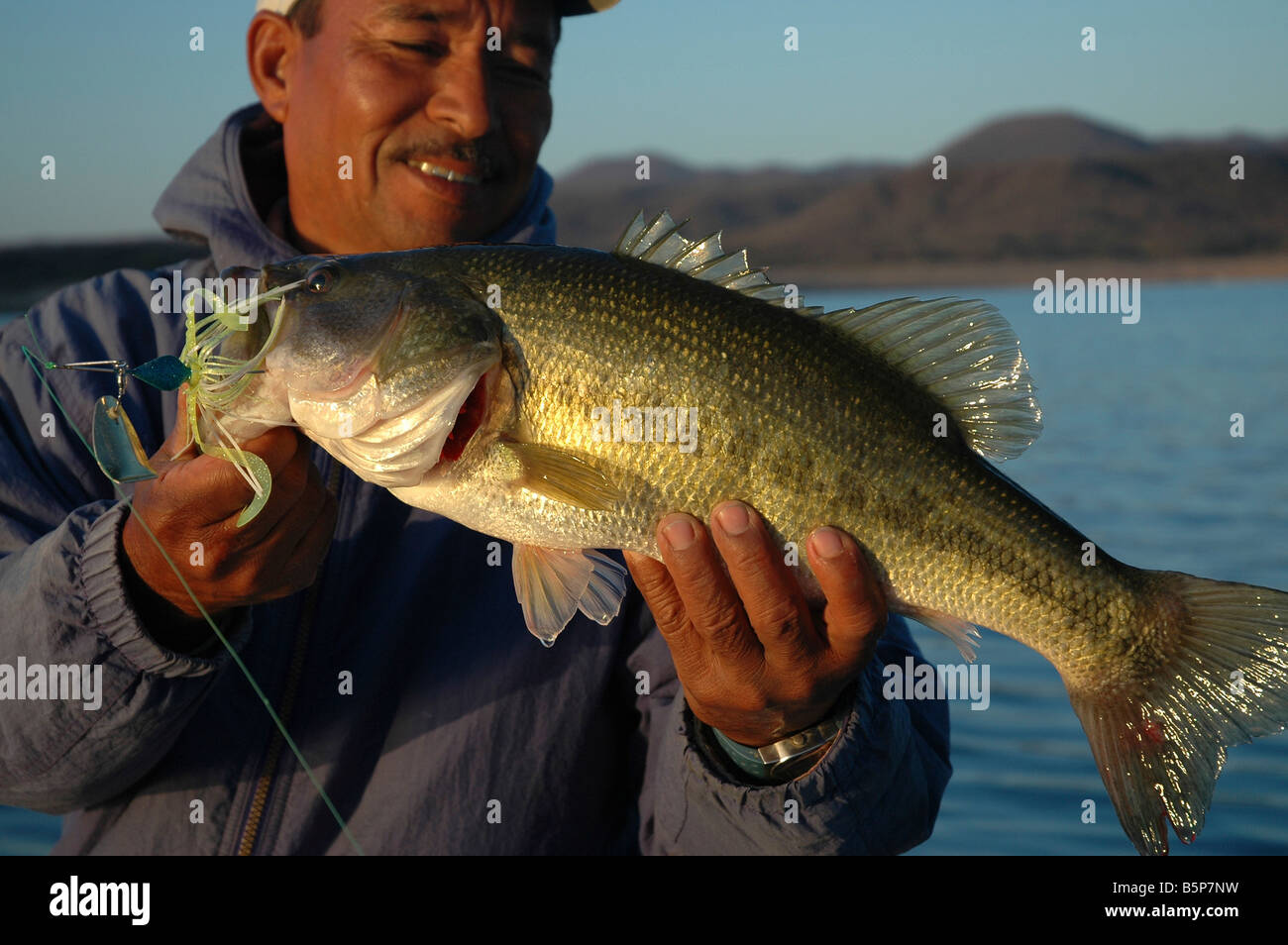 Bass trophy largemouth reservoir lake fisherman fish mexico spring