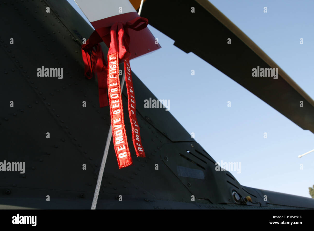 remove before flight safety tag on military helicopter at open day