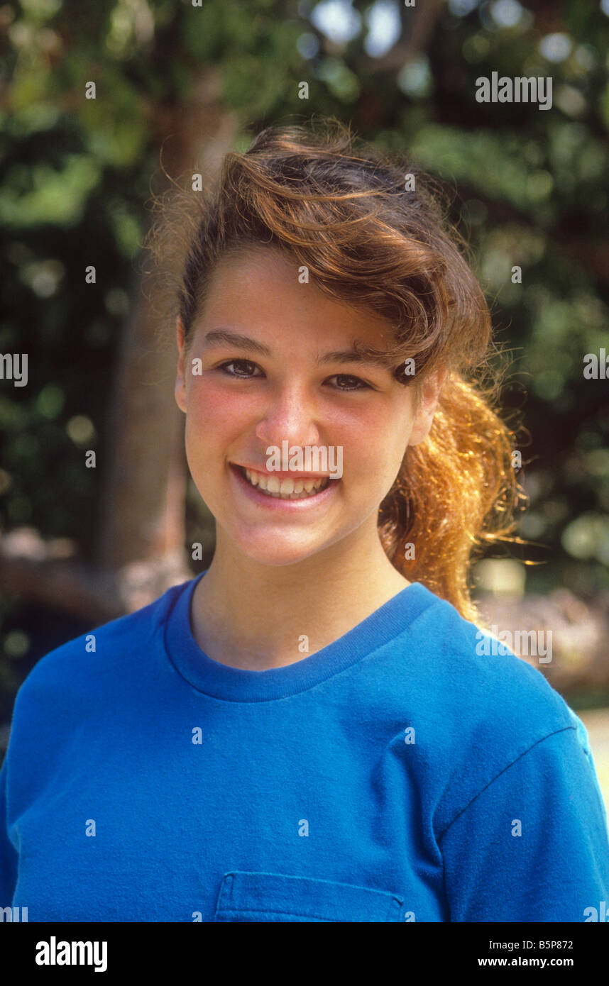 Portrait of smiling teen girl Stock Photo - Alamy