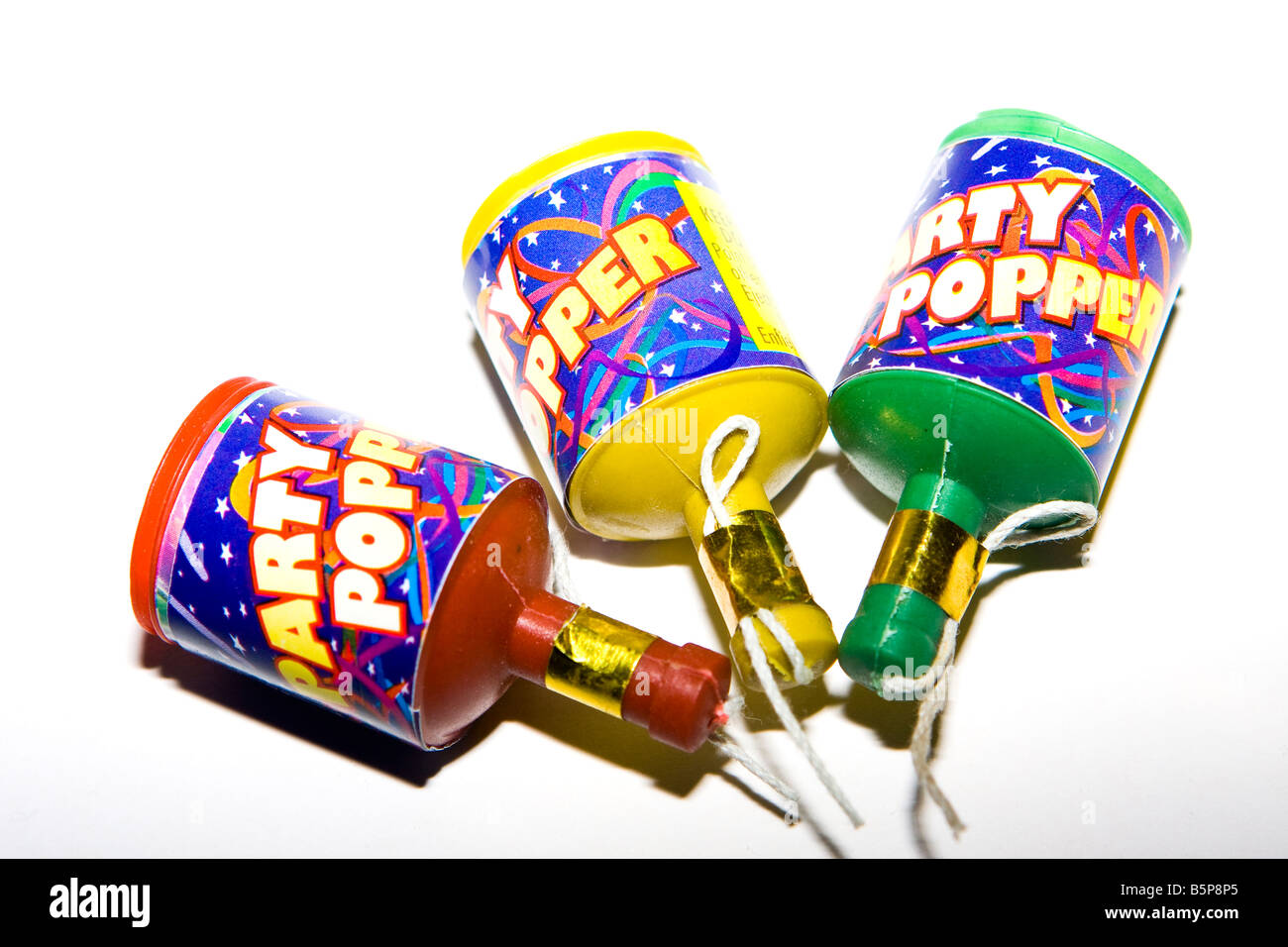 Three Party poppers Stock Photo