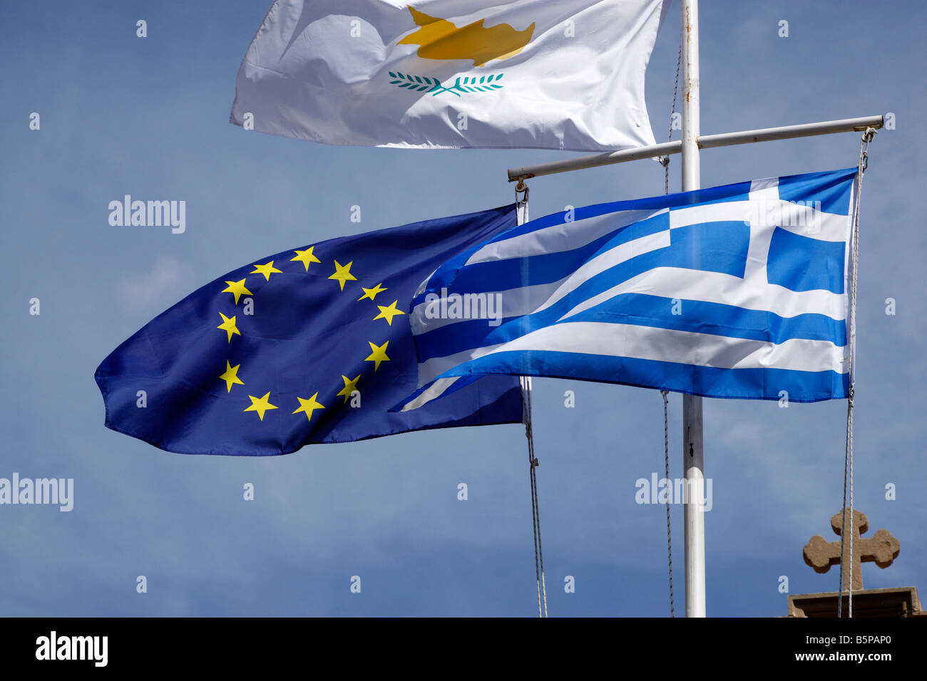 the flags of the european union cyprus and greece flying on poles kalavasos cyprus Stock Photo