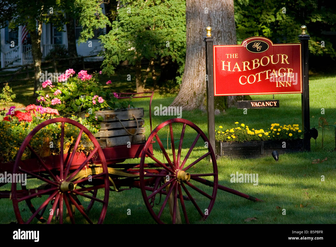 Bed and Breakfast sign and wagon in yard, Bar Harbor, Maine, USA Stock Photo