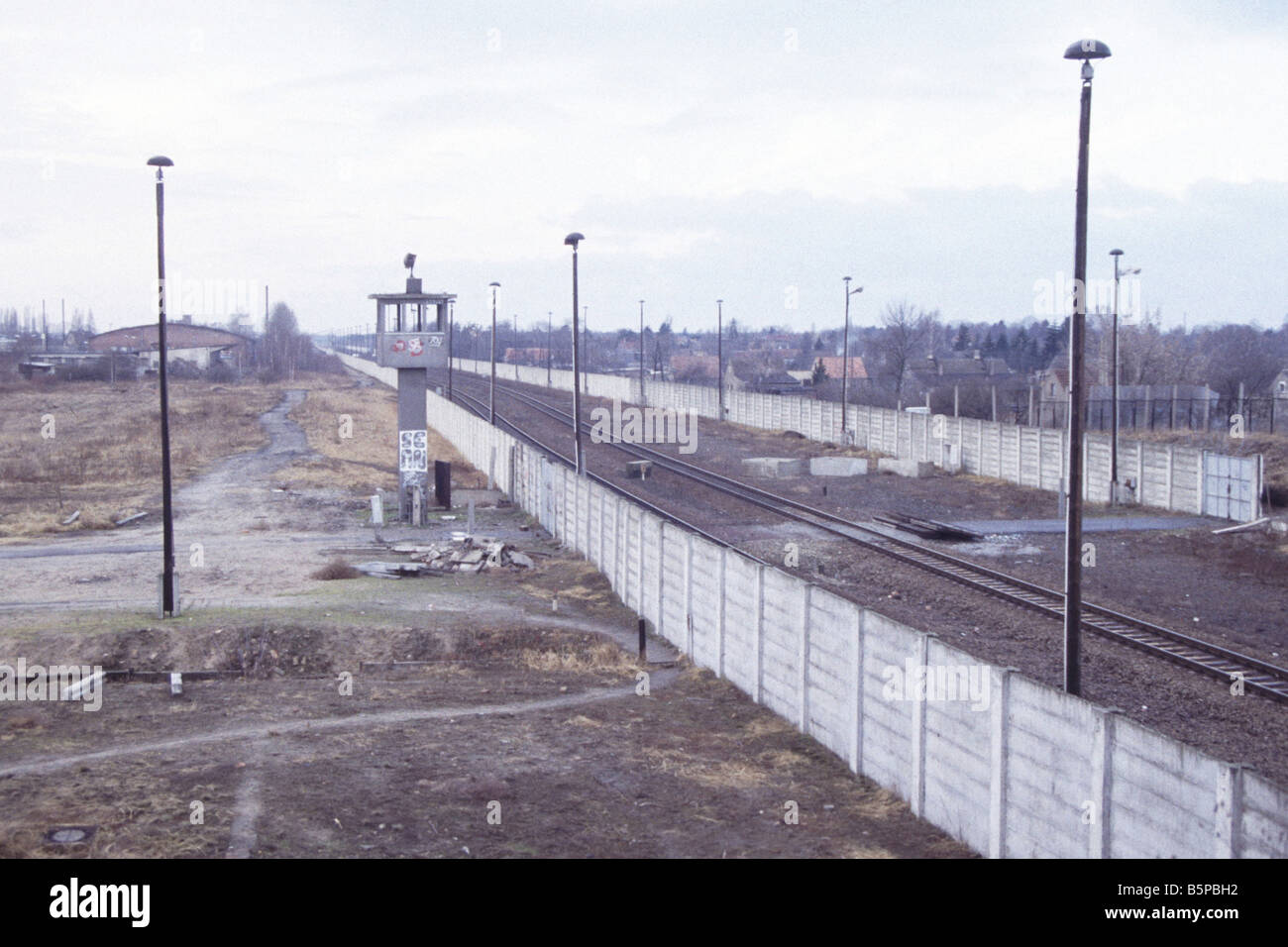 The  Berlin Wall and watch tower at Staaken, Berlin, at the end of the Cold War in 1991 Stock Photo