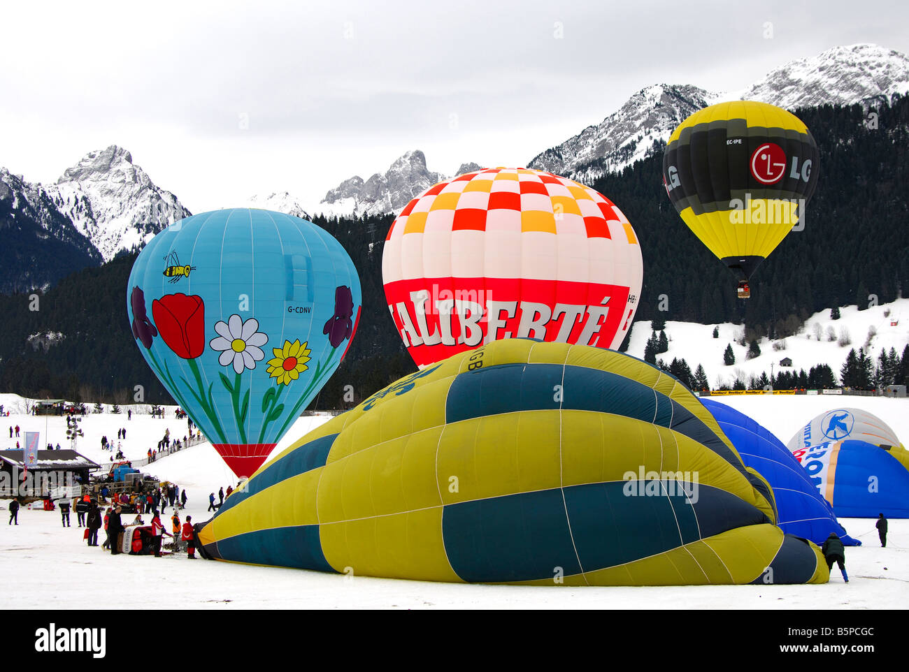 Hot air balloons on the launching site, International Balloon Festival, Chateau d Oex, Switzerland Stock Photo