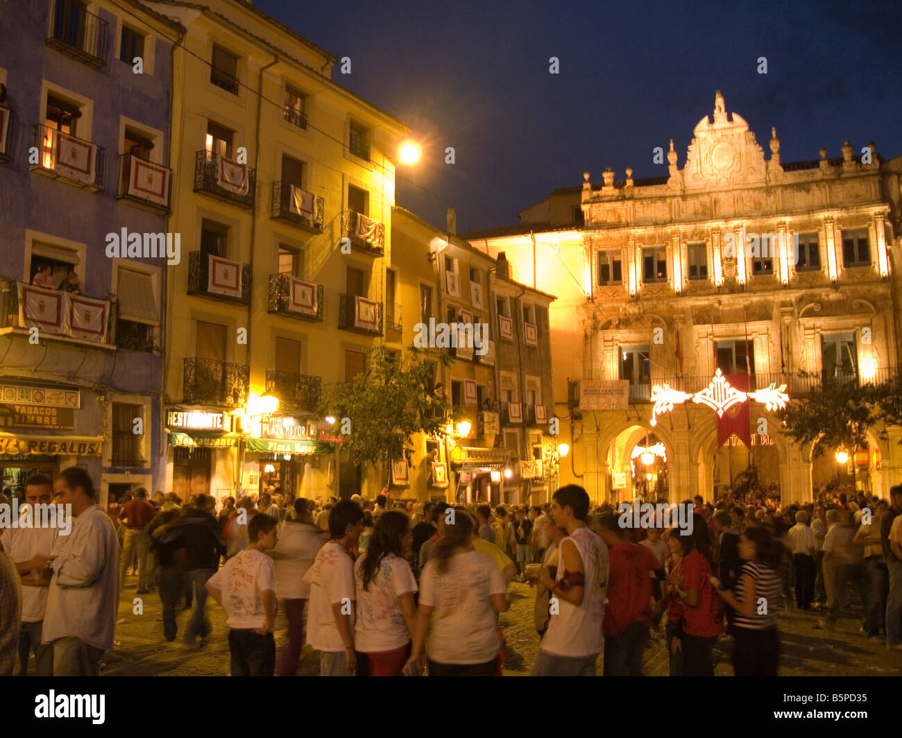 Crowd gathered around the Cathedral, Cuenca during the Evening Fiesta of San Mateo. Stock Photo