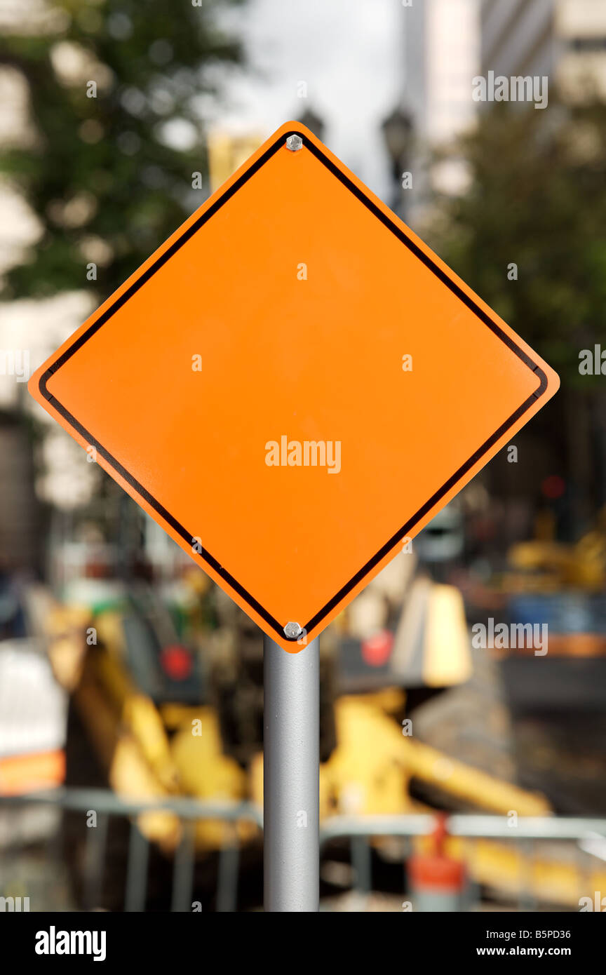 blank street signs orange