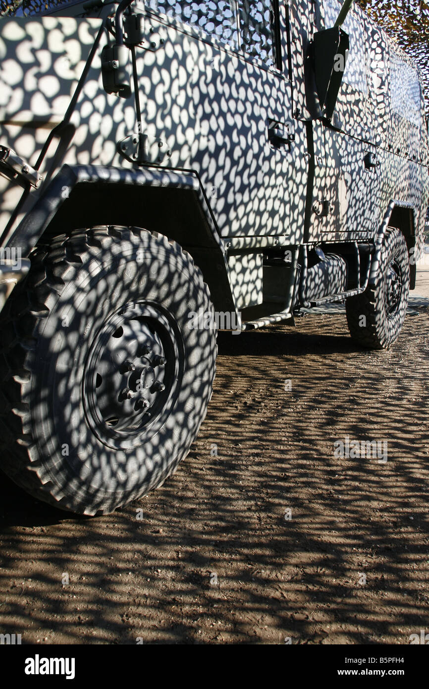 truck in camouflage military army base tent at open day Stock Photo - Alamy