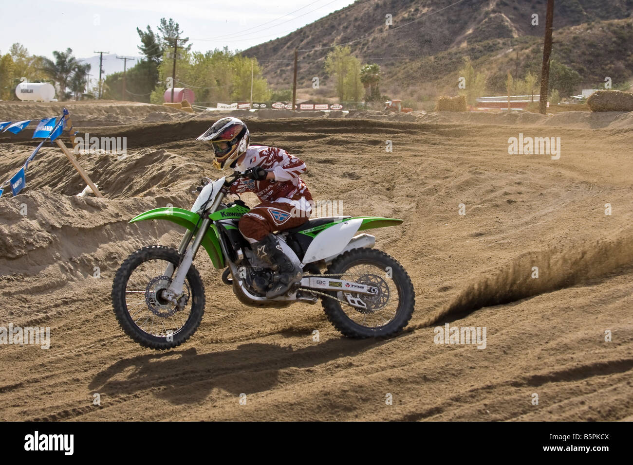Motorcross rider sweeping through a bend at Glen Helen circuit Devore California. Stock Photo