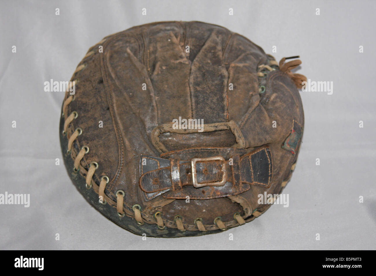 Old time catcher's mitt that would be a treasure for any sports memorabilia collector. Stock Photo