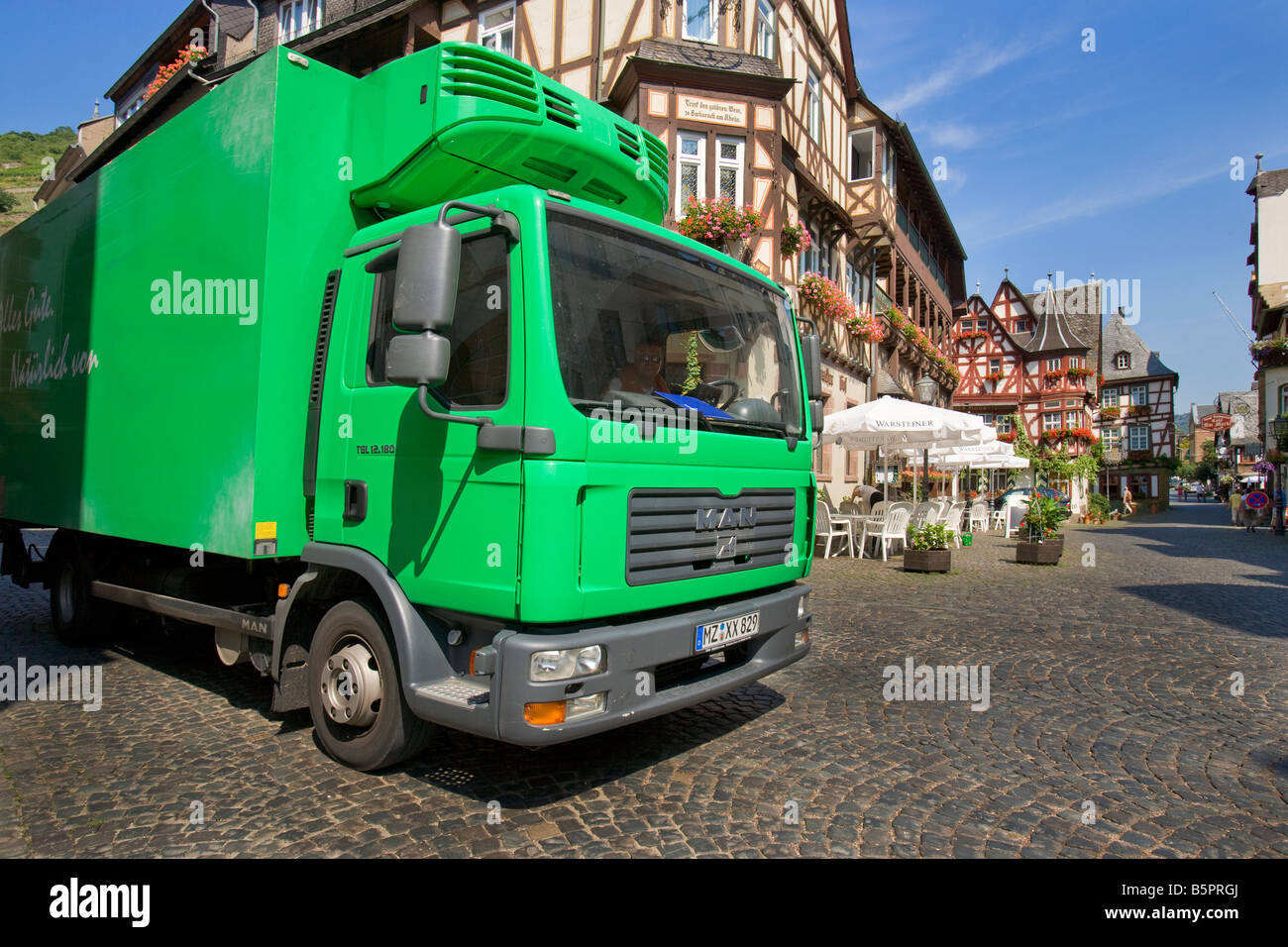Truck navigating small German village along the Rhine.  Bacharach, Germany Stock Photo