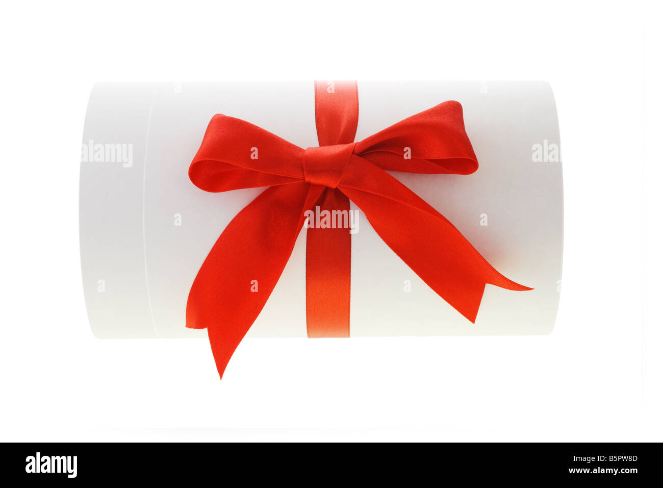 Blank cylindrical shape gift box with red bow ribbon Stock Photo