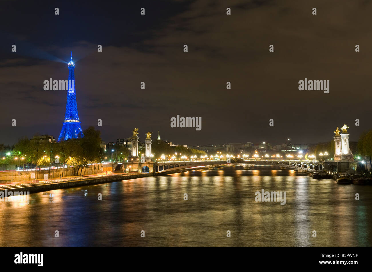 Eiffel Tower and Alexandre III Bridge at night, Paris France Stock Photo