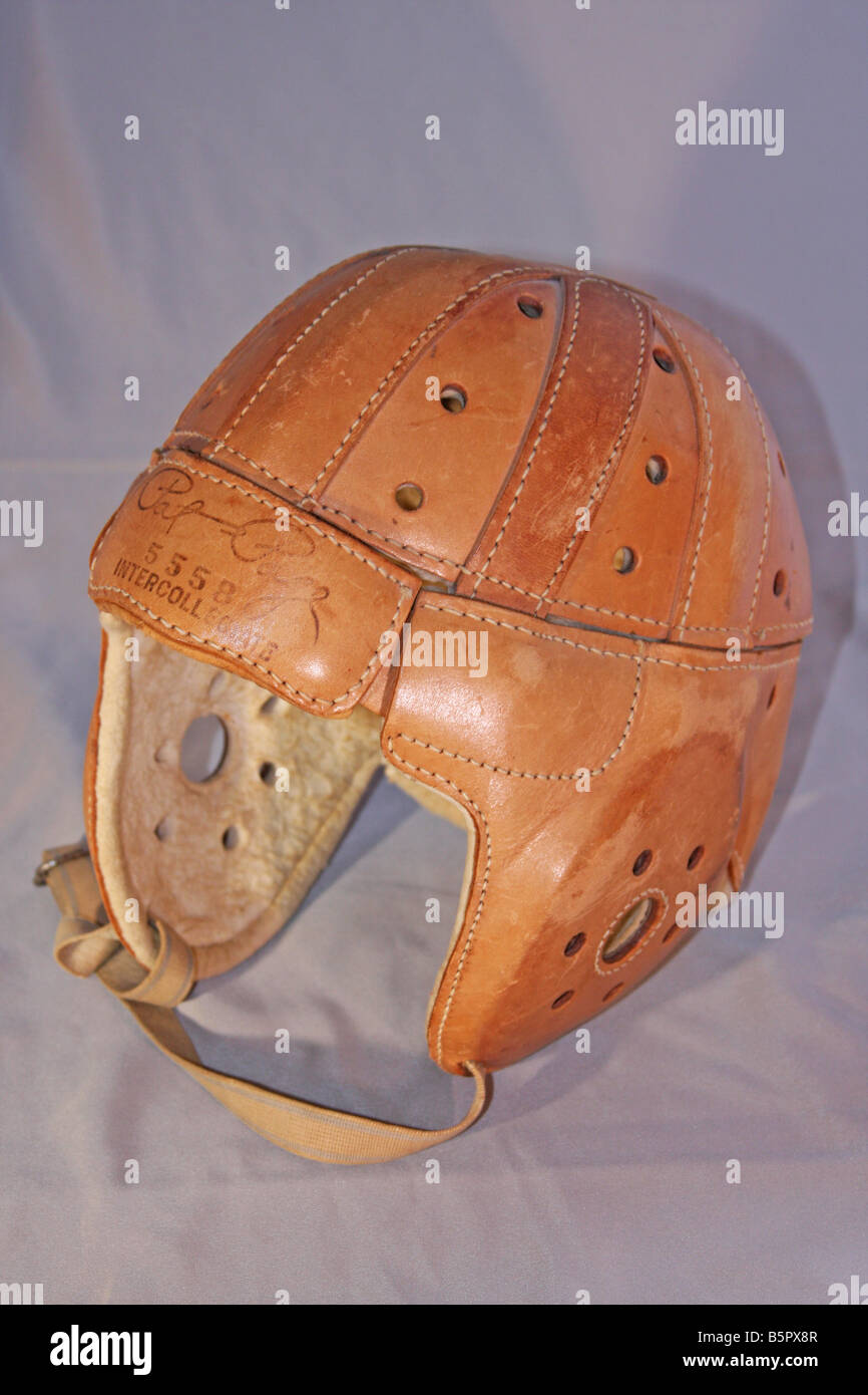 Old leather football helmet that would be a treasure for any sports memorabilia collector. Stock Photo