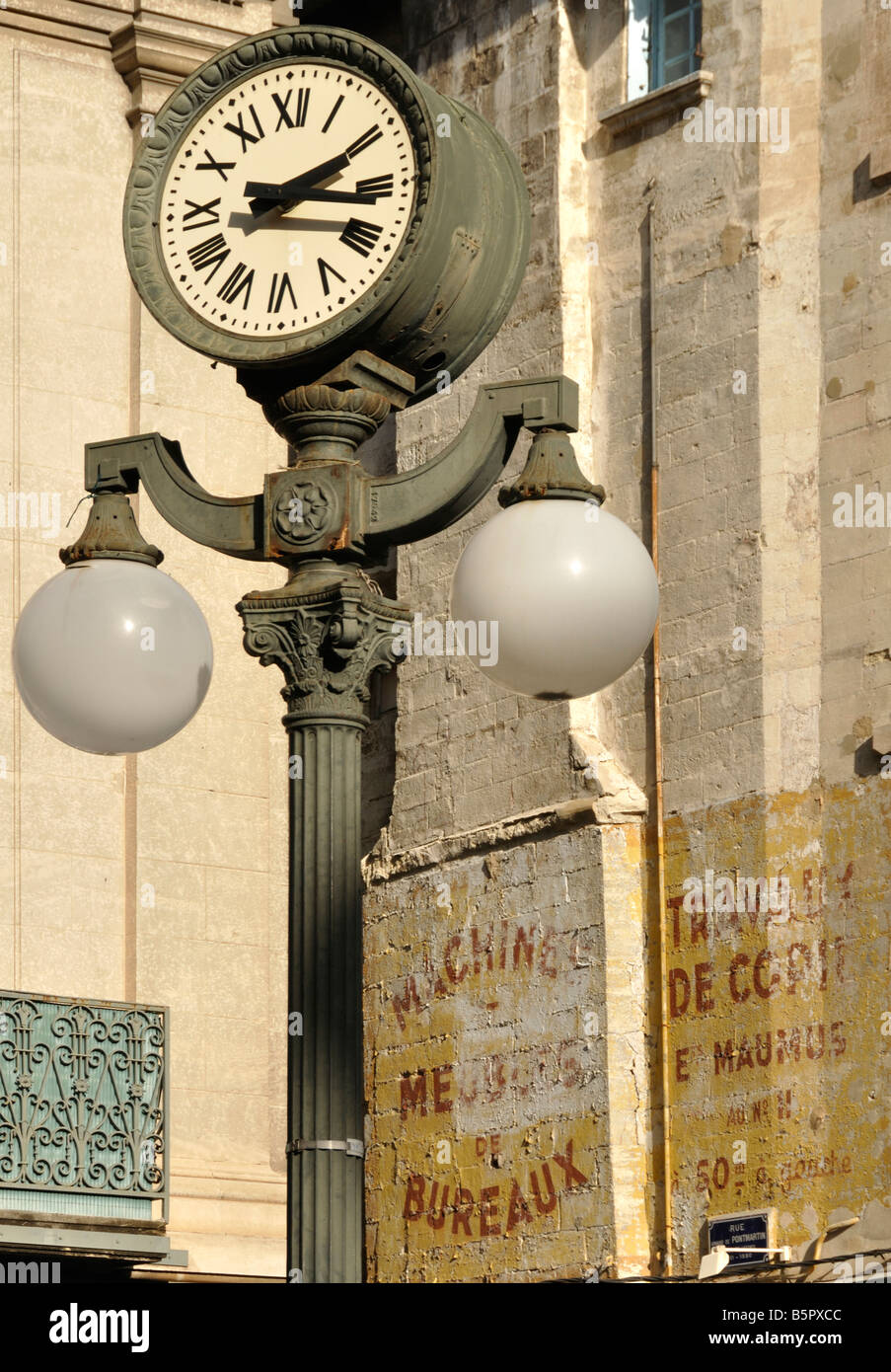 Clock and lampost Avignon France Stock Photo
