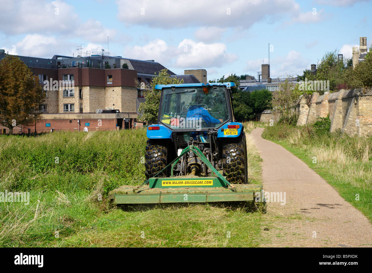 Tractor cutting grass hires stock photography and images Alamy