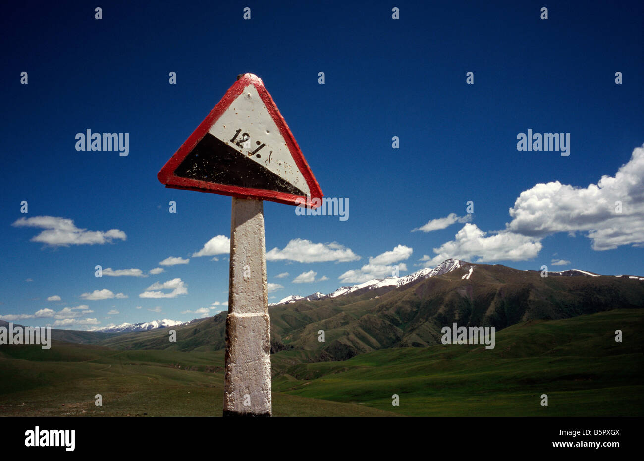 June 17, 2006 - Sign post on the road to Naryn in the Kyrgyz Tian Shan mountains. Stock Photo