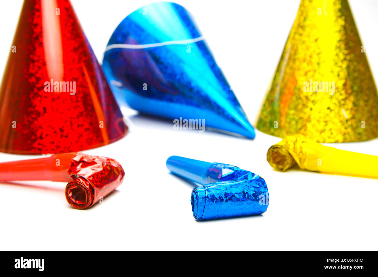 Party hats and blowers isolated against a white background Stock Photo ...