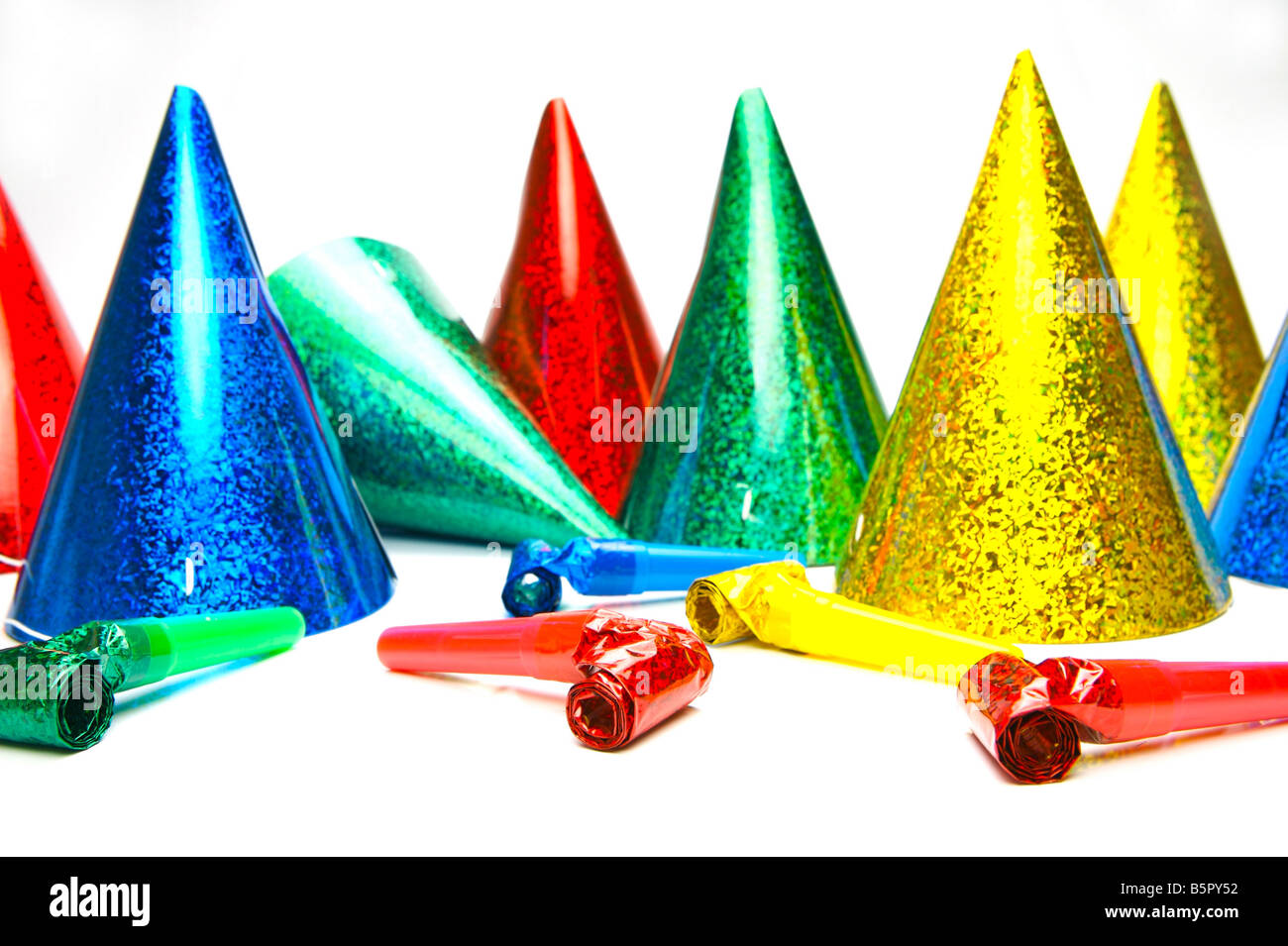 Party hats and blowers isolated against a white background Stock Photo ...