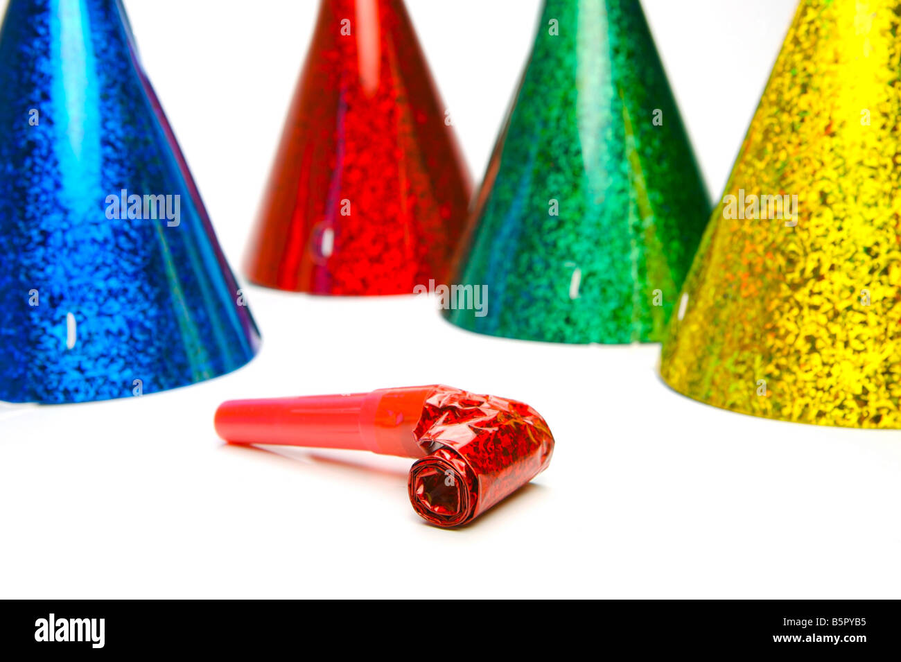 Party hats and blowers isolated against a white background Stock Photo ...