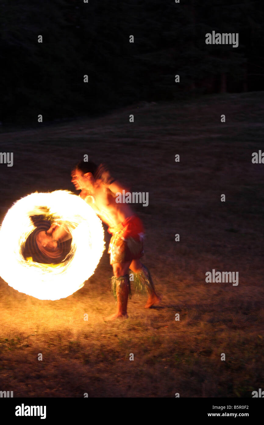 Hawaiian Fire Dancer performing at night Stock Photo