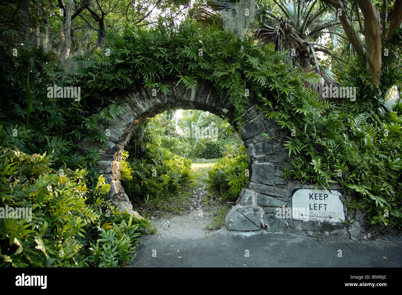 View of a Moon Gate in garden setting at Palm Grove Garden, Devonshire Parish, Bermuda Stock Photo