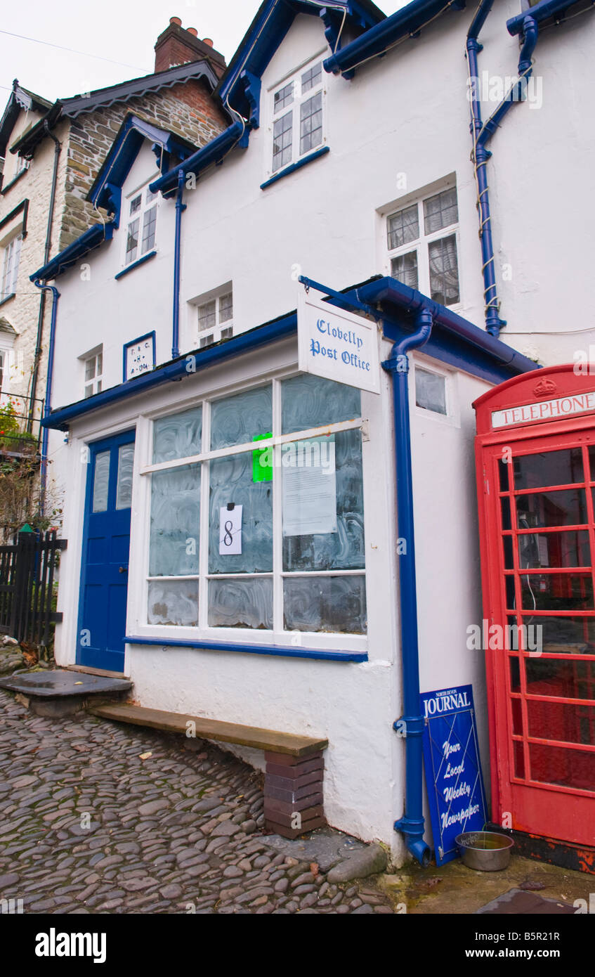 Closed Post Office in the coastal village of Clovelly North Devon England UK next to red telephone box Stock Photo