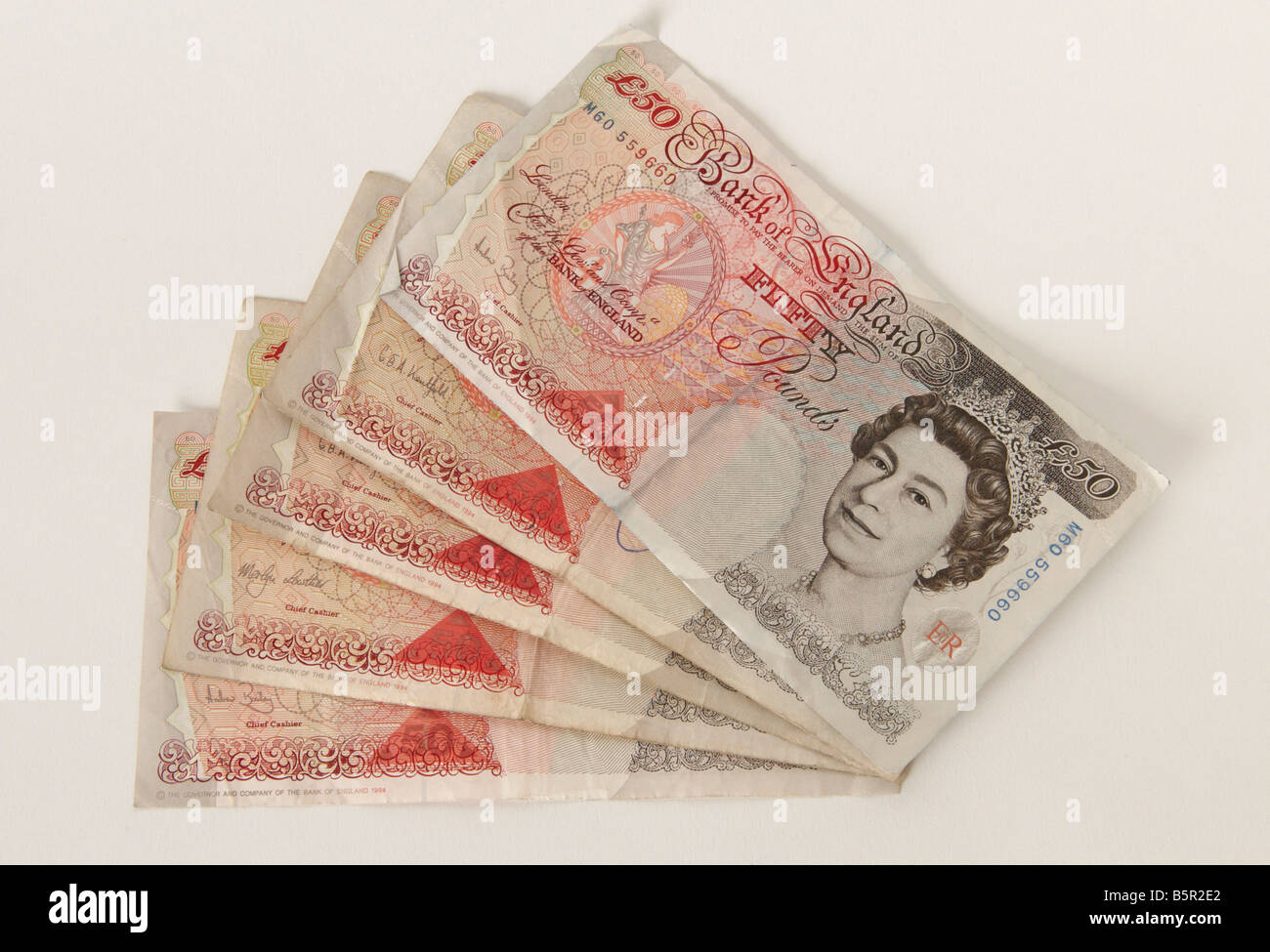 A pile of British Pound £50 banks notes Stock Photo