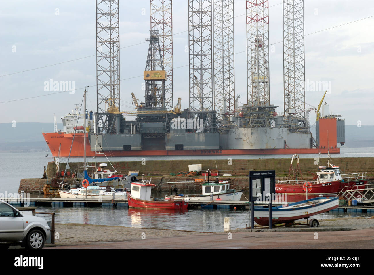 Oil rigs transported to Cromarty Firth Stock Photo