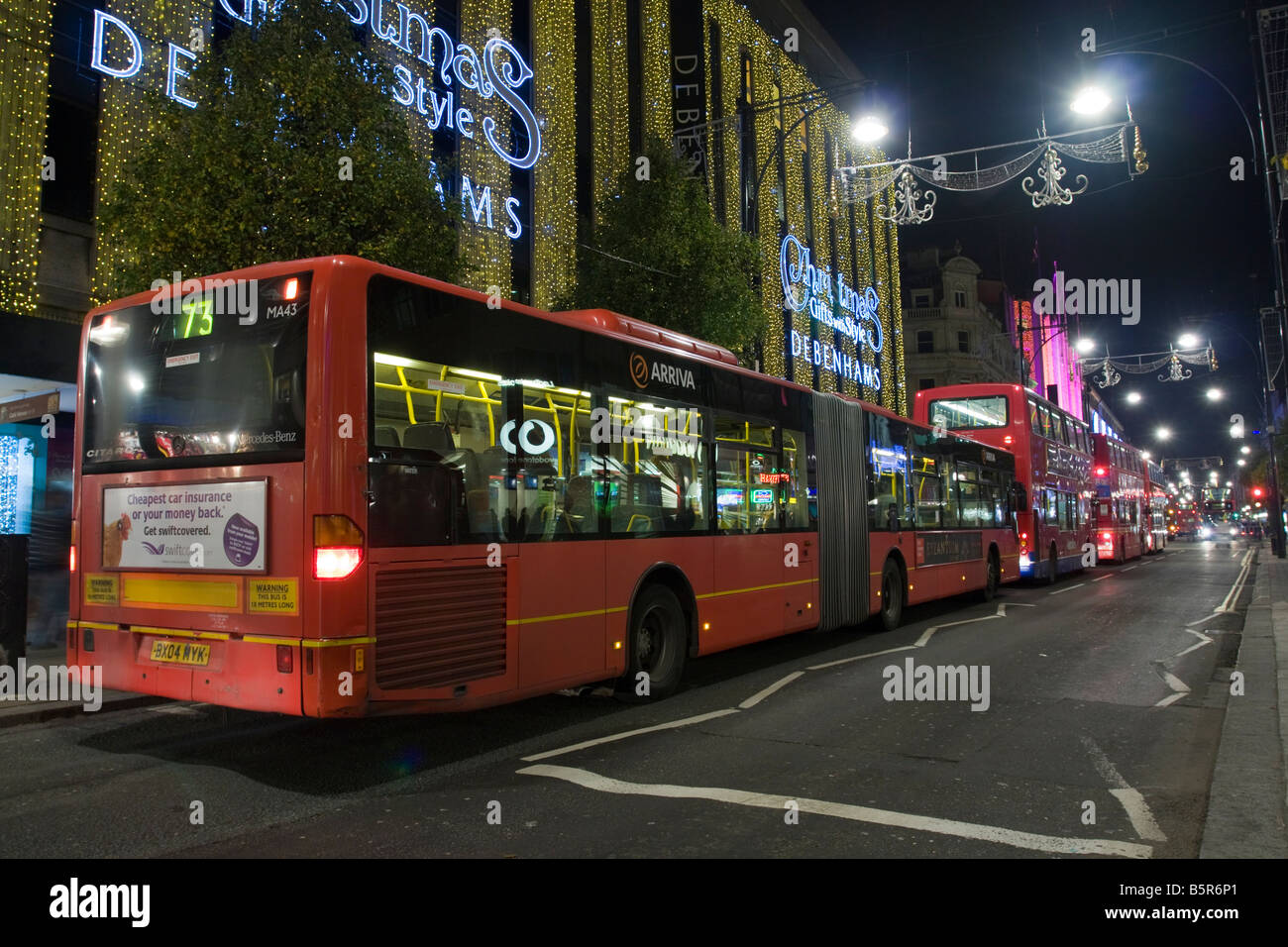 Back of Mercedes-Benz Citaro (Bendy Bus) in Oxford Street London Stock Photo