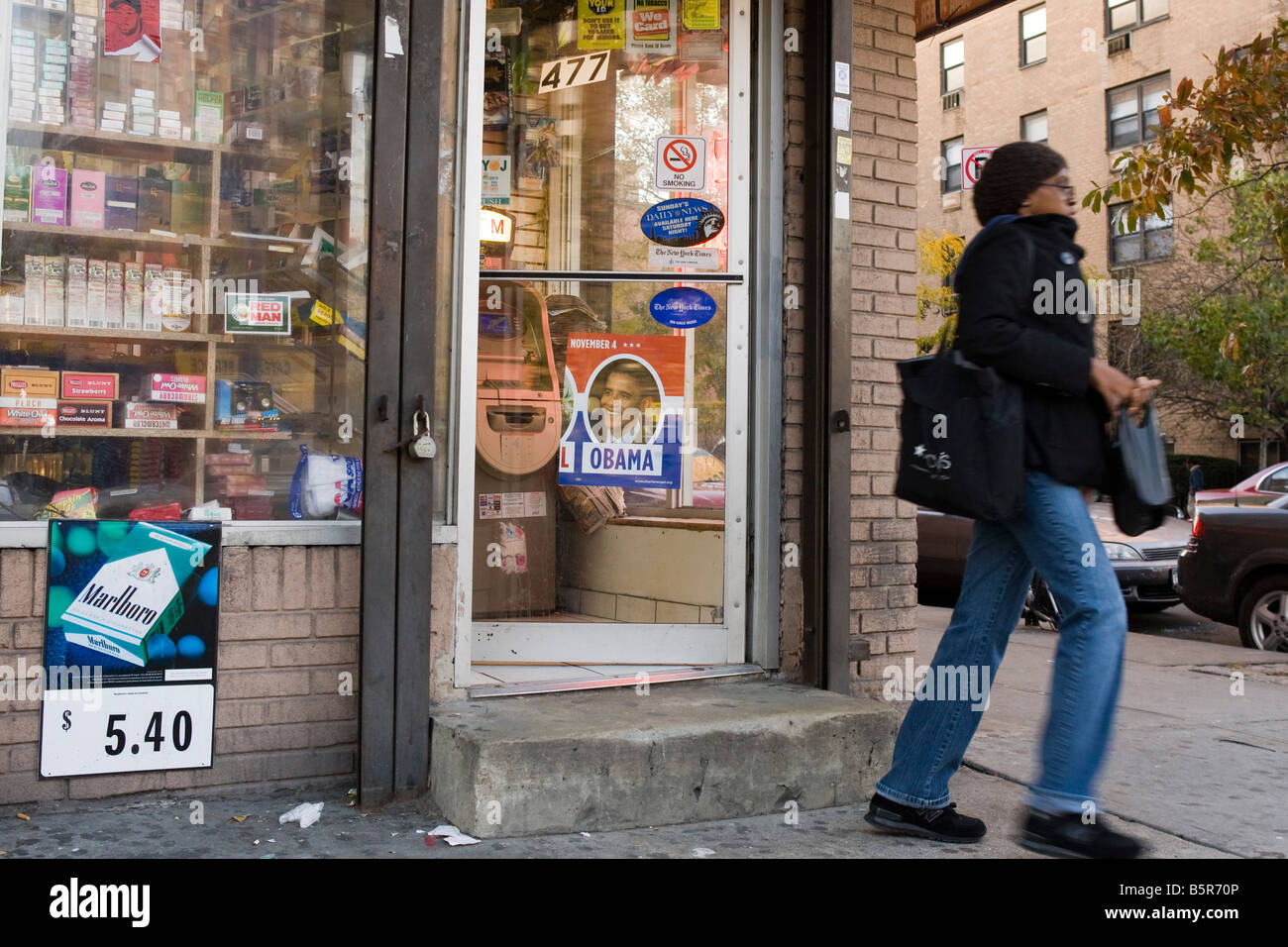Obama sign in a store window in Harlem, Manhattan, New York City, USA Stock Photo