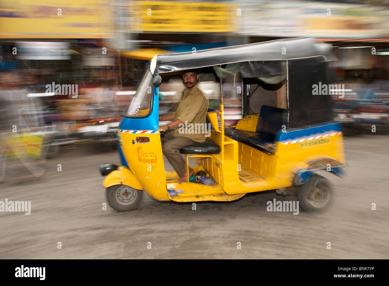 Auto rickshaw on a street in Pondicherry India. Stock Photo