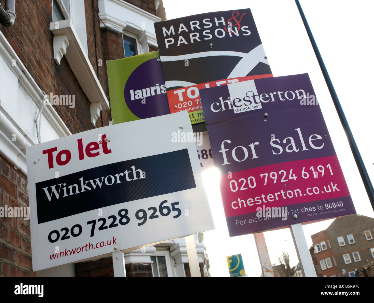 A row of to let and for sale signs outside a maisonette in London, England, UK Stock Photo