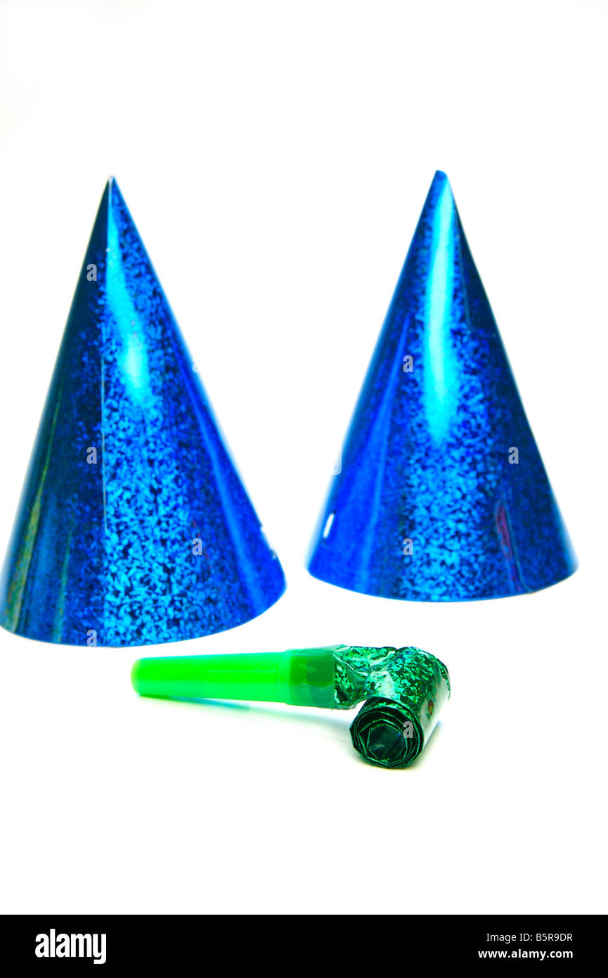 Party hats and blowers isolated against a white background Stock Photo ...