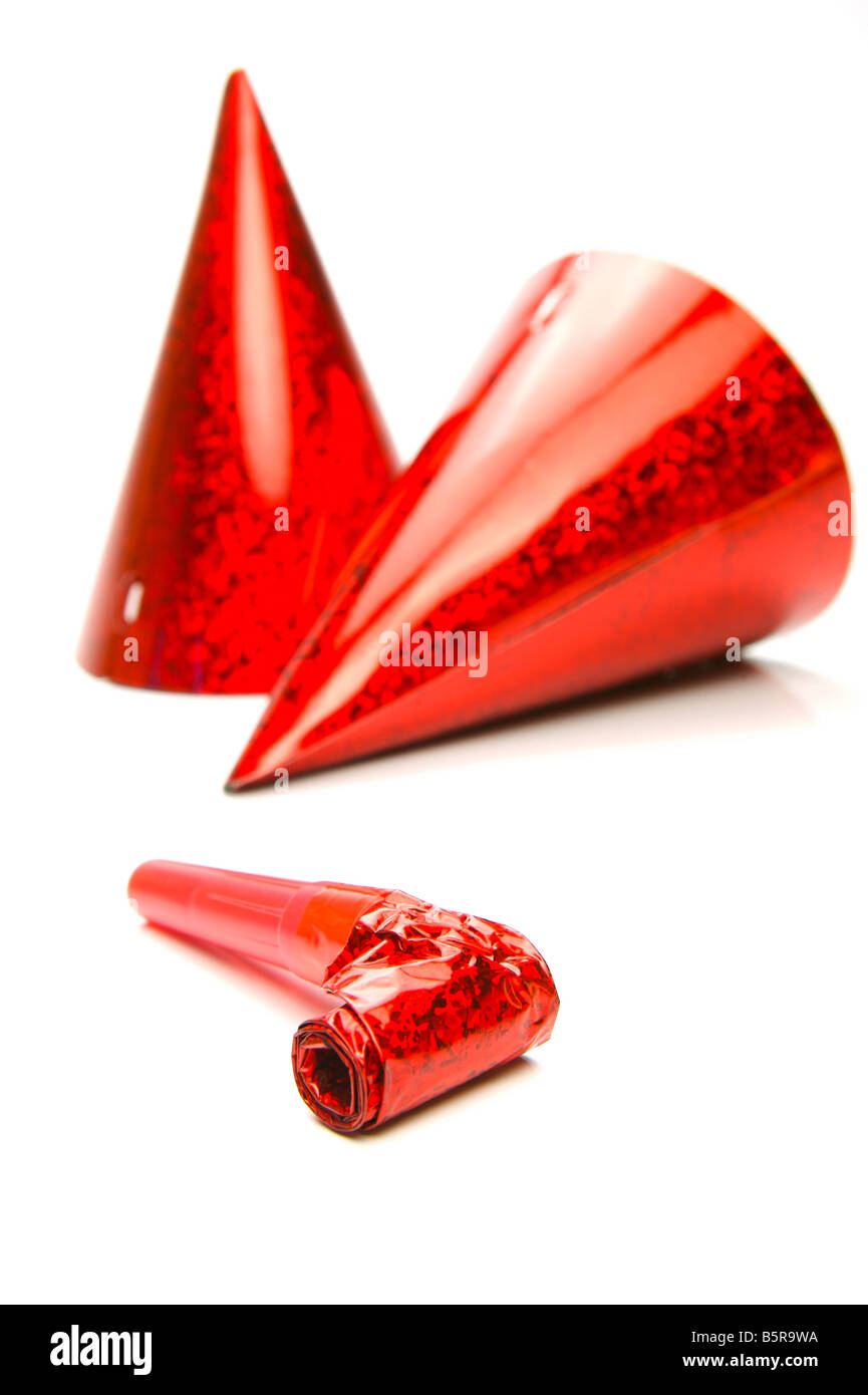 Party hats and blowers isolated against a white background Stock Photo ...