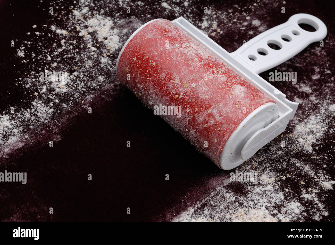 Lint roller Stock Photo - Alamy