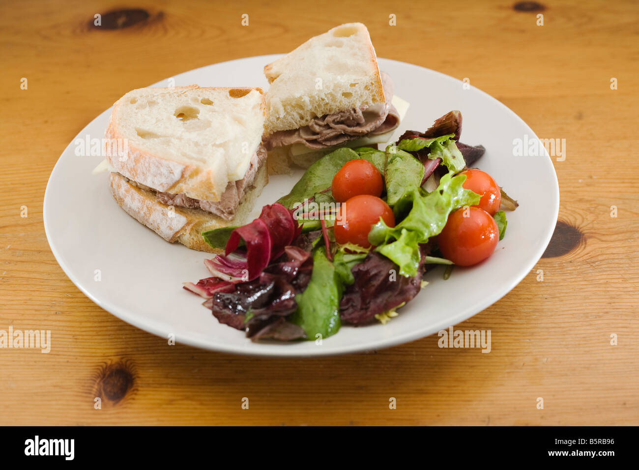 Gourmet sandwich and salad Stock Photo