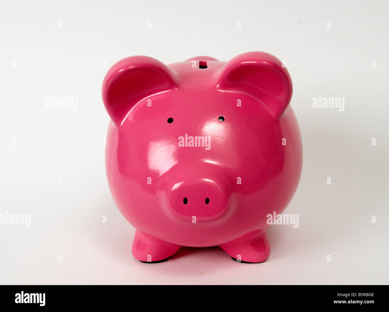 Pink Piggy Bank on white background Stock Photo - Alamy