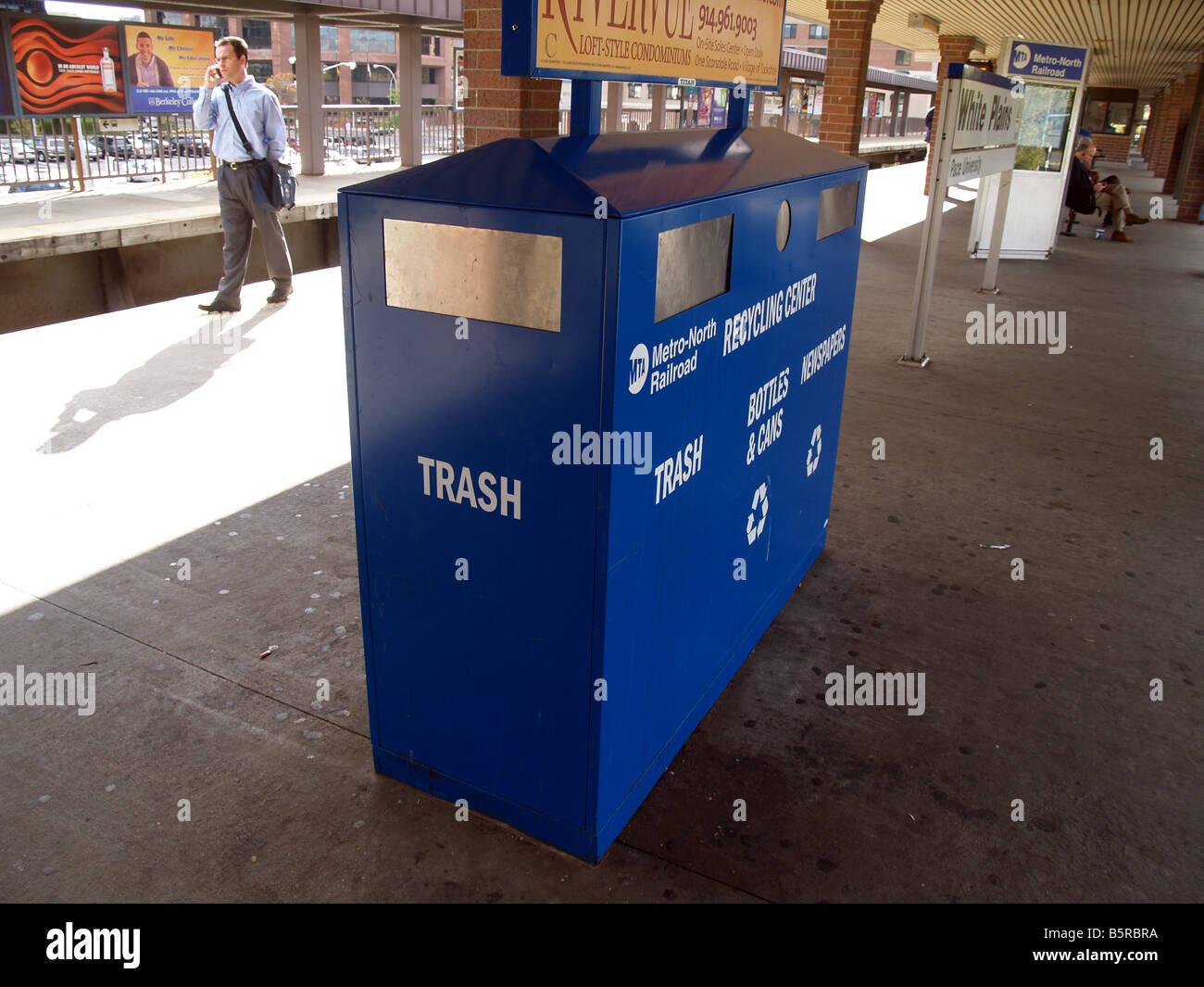 Trash disposal and recycling unit at train station in New York Stock Photo