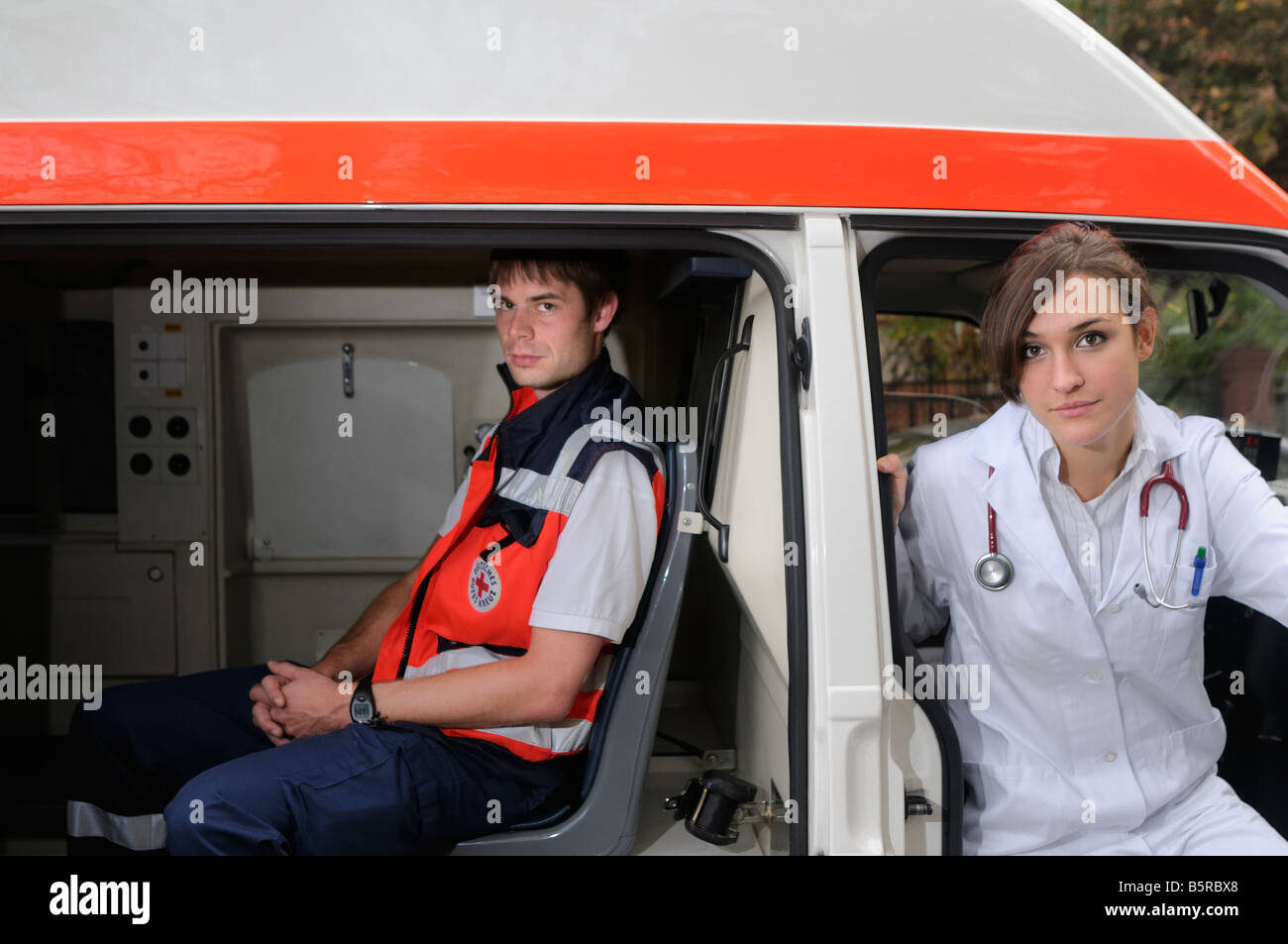 PEINE / GERMANY - JUNE 22, 2019: German female paramedic stands in front of  an ambulance car. Rettungsdienst means ambulance service Stock Photo - Alamy