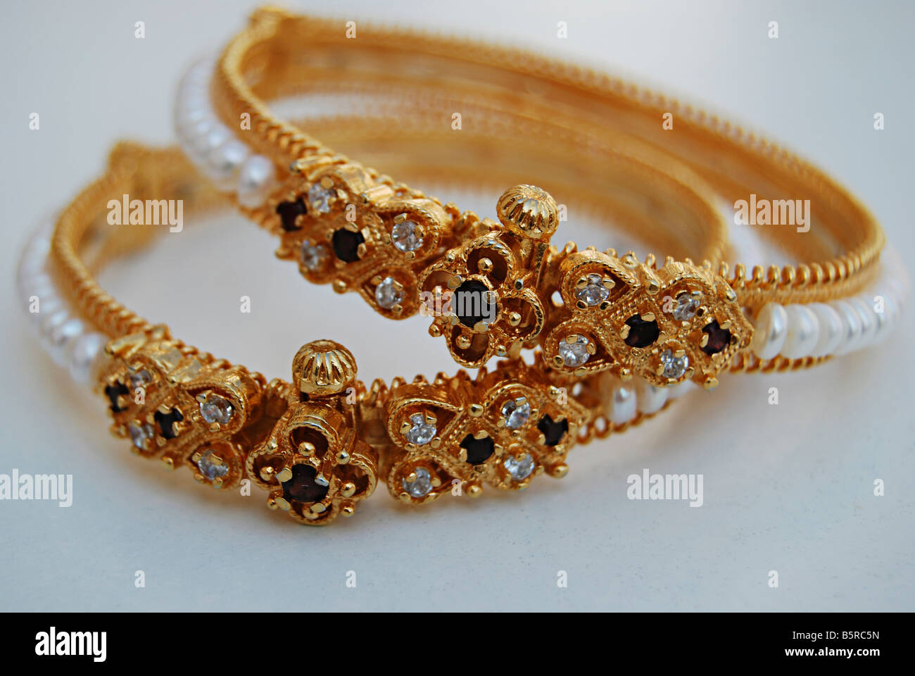 diamond studded pearl bangles Stock 