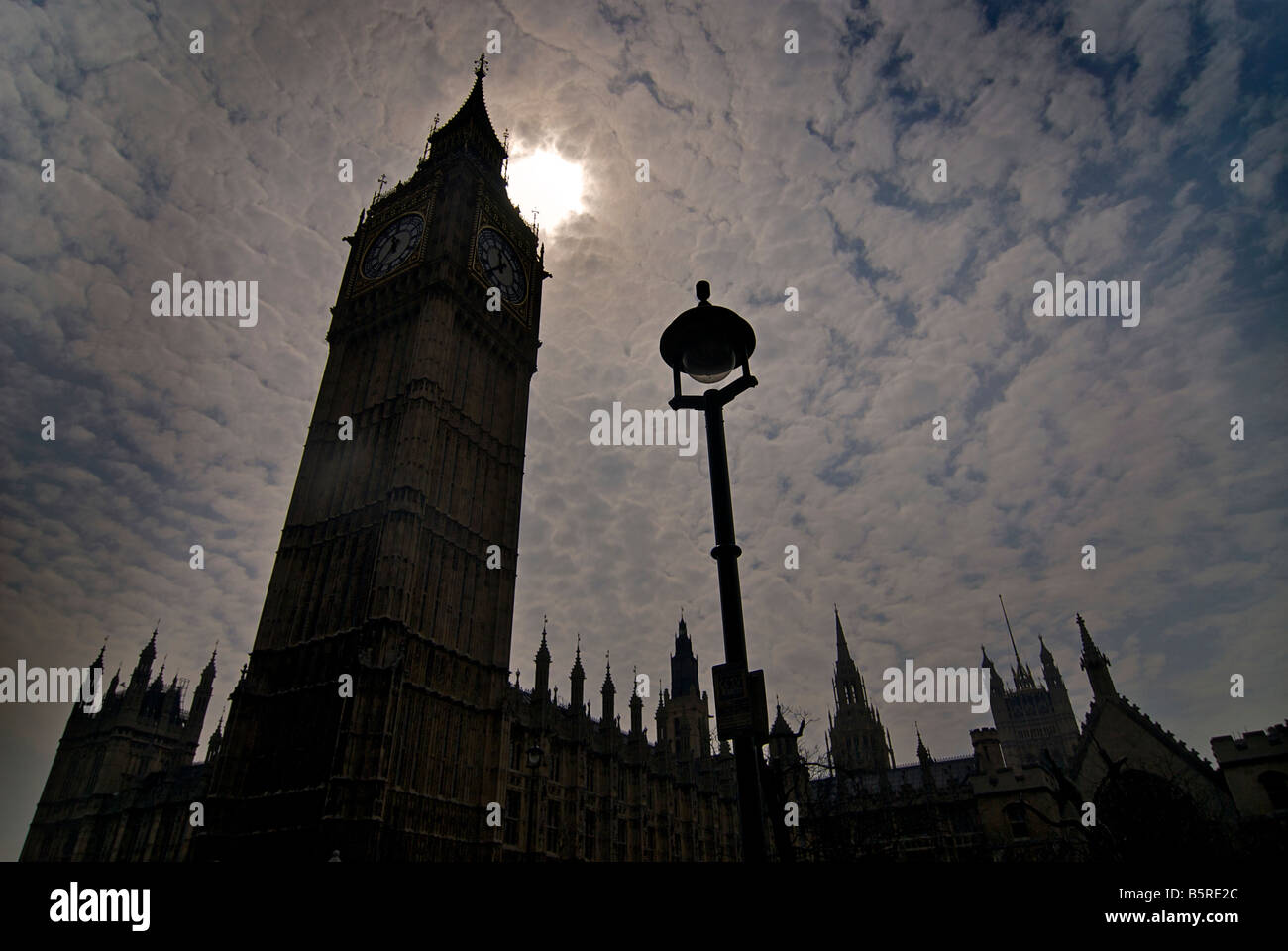 ElizabethTower housing Big Ben silhouetted against the sun. Parliament, Westminster, London Stock Photo