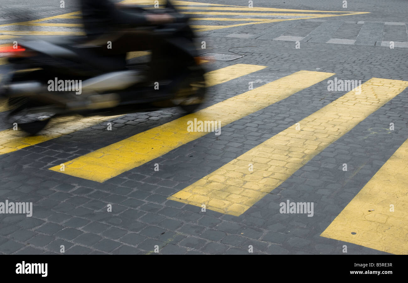 Moped over a Crossing Stock Photo Alamy