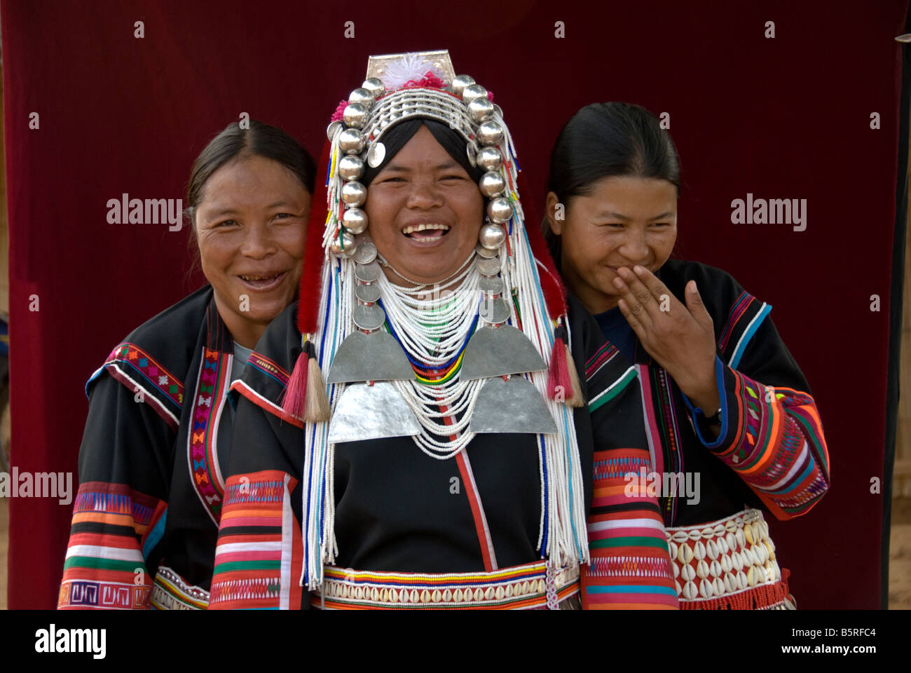 Three Akha hill tribe women pose for a photograph Stock Photo - Alamy