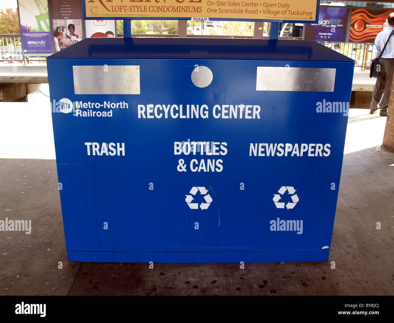 Trash disposal and recycling unit at train station in New York Stock Photo