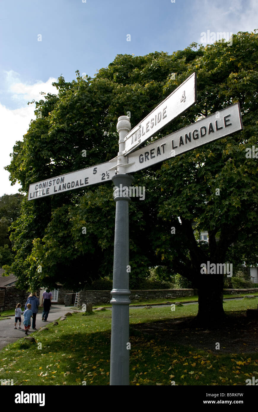 Signpost in Elterwater, Lake District, Cumbria Stock Photo - Alamy