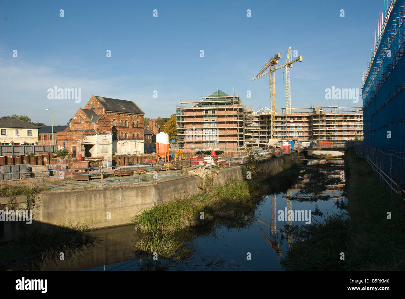 Construction site during riverside redevelopment in Market Harborough Leics Stock Photo