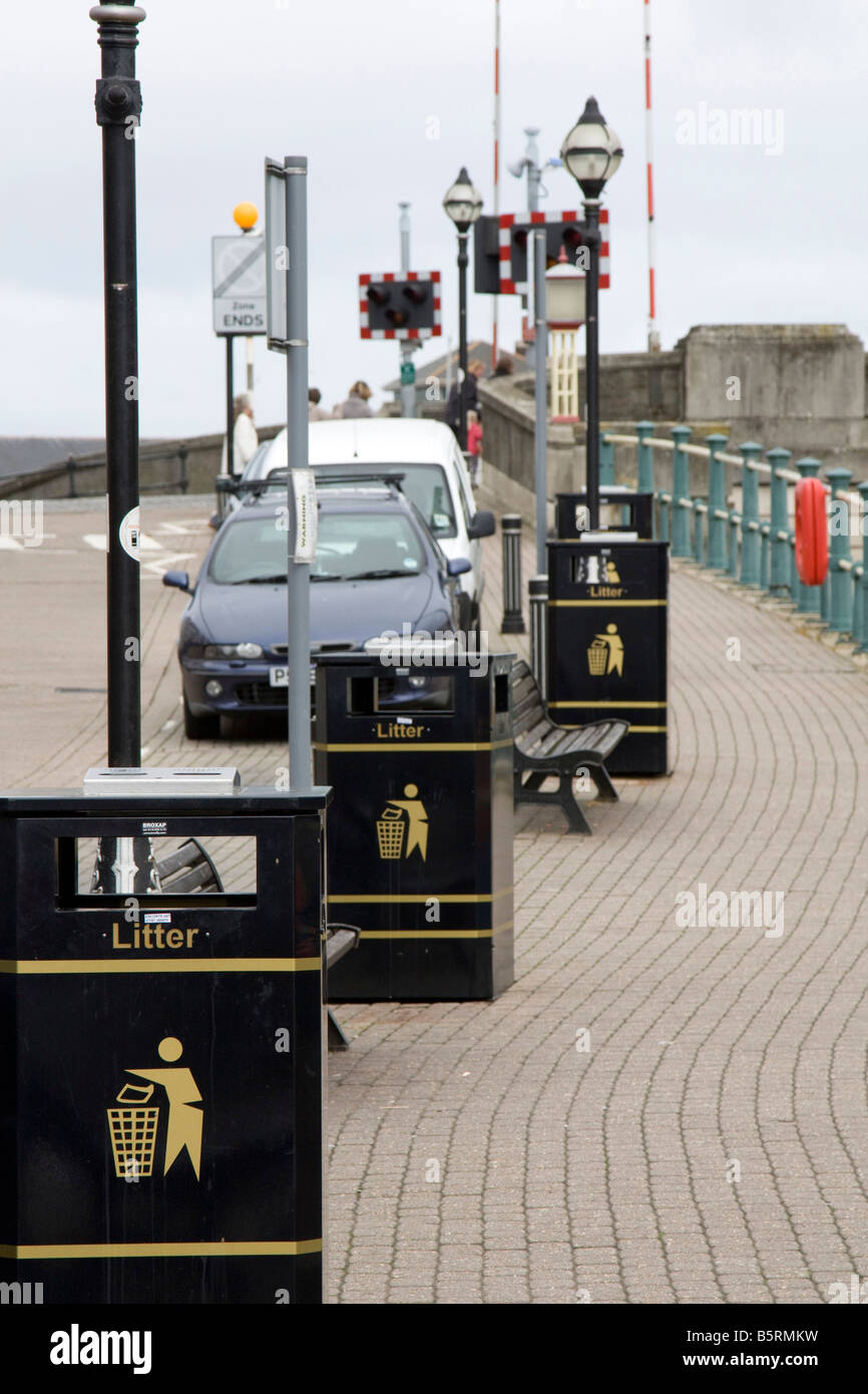row of large litterbins taking up one third of the footway weymouth england uk gb Stock Photo